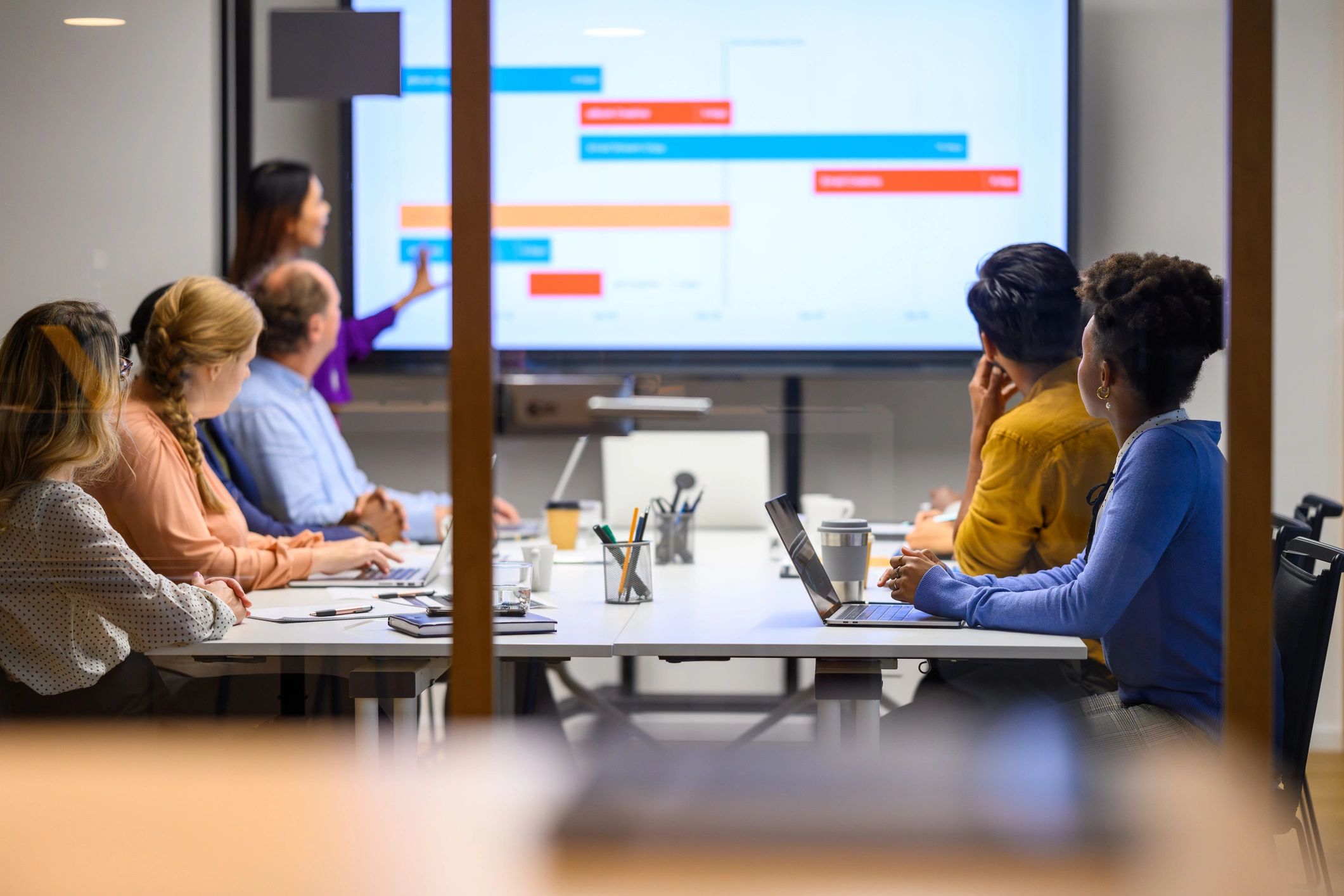 Business strategy presentation in a board room