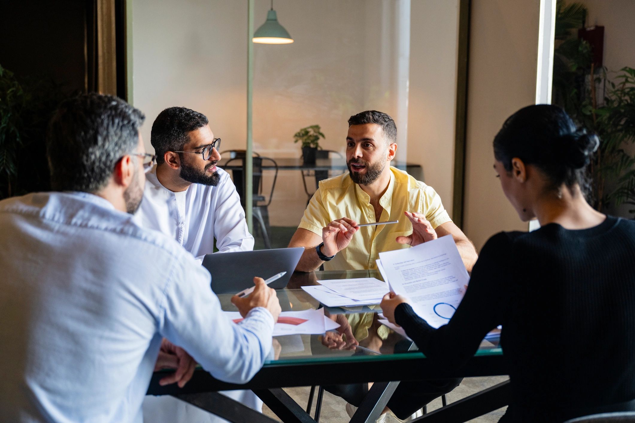 Consulting team reviewing strategy documents in an office