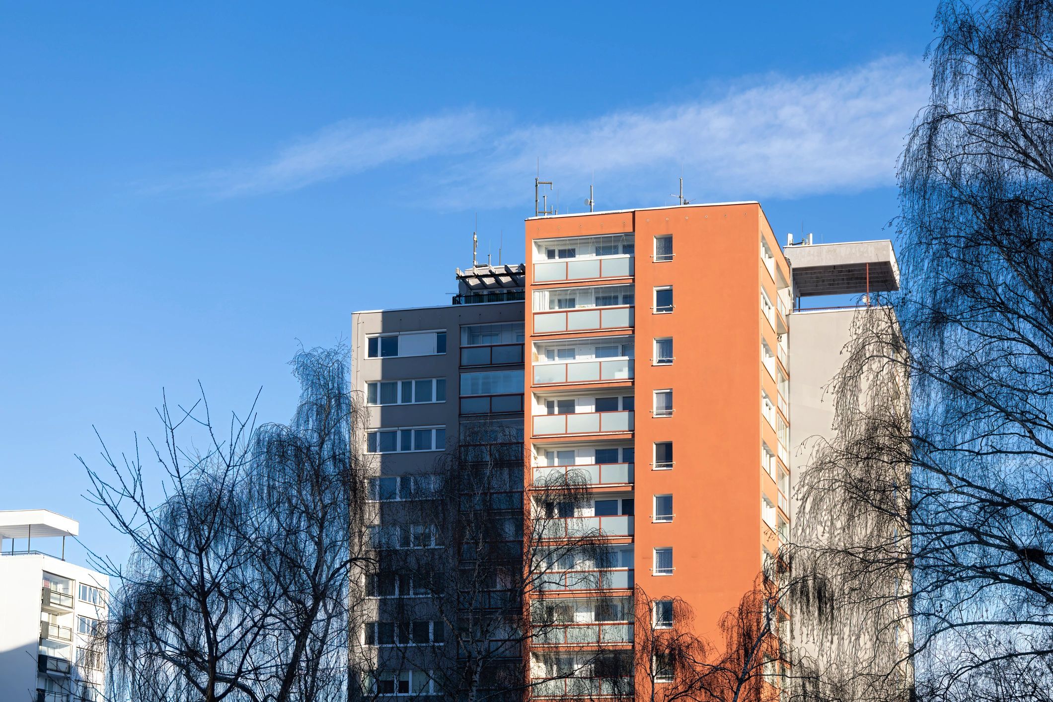 Residential apartment buildings under blue sky